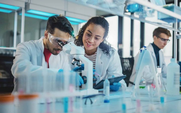 Modern,Medical,Research,Laboratory:,Portrait,Of,Latin,And,Black,Young